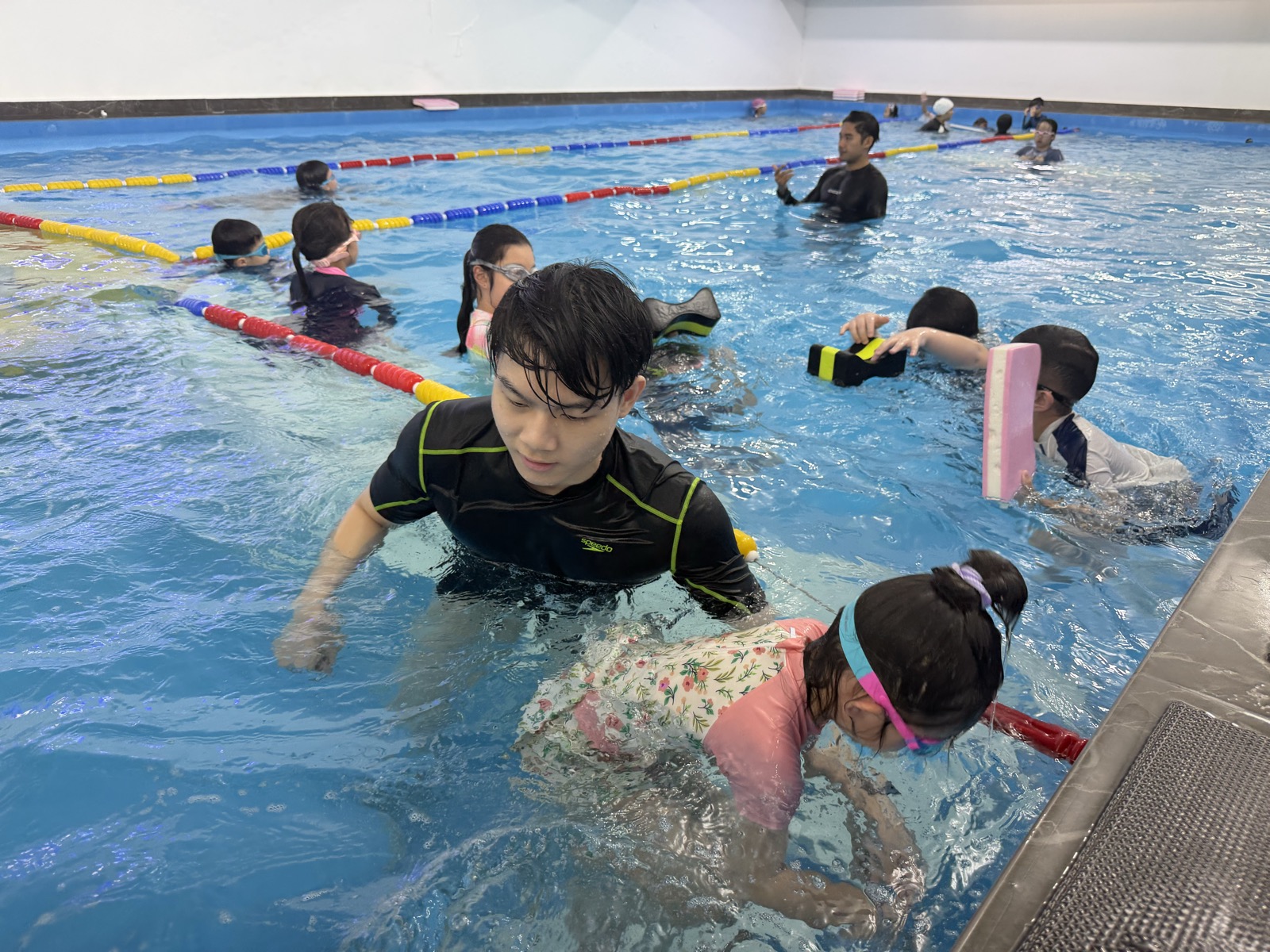Kids swimming lessons in progress at Skywhale